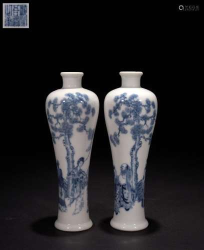 A Pair of Blue and White Panasonic Figures Appreciating Bott...