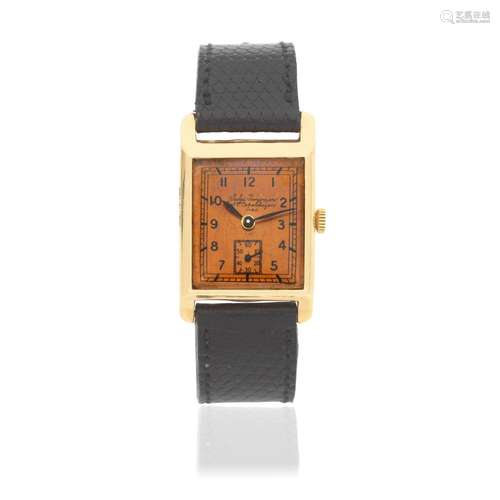 【Y】Jules Jurgensen. A 14K gold manual wind rectangular wrist...