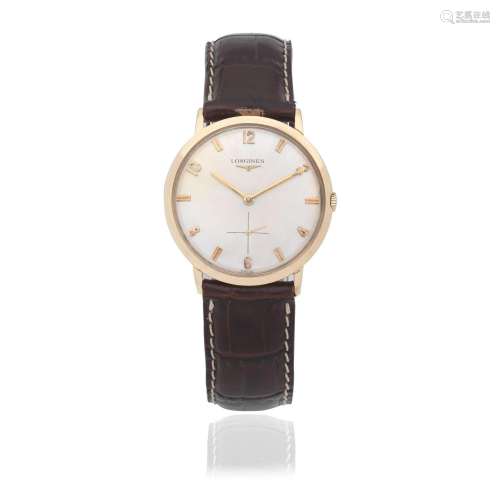 Longines. A 14K gold manual wind wristwatch  Circa 1962