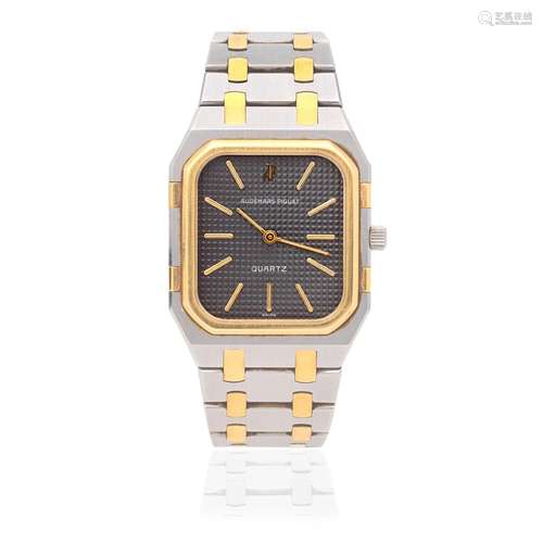 Audemars Piguet. A stainless steel and 18K gold quartz brace...