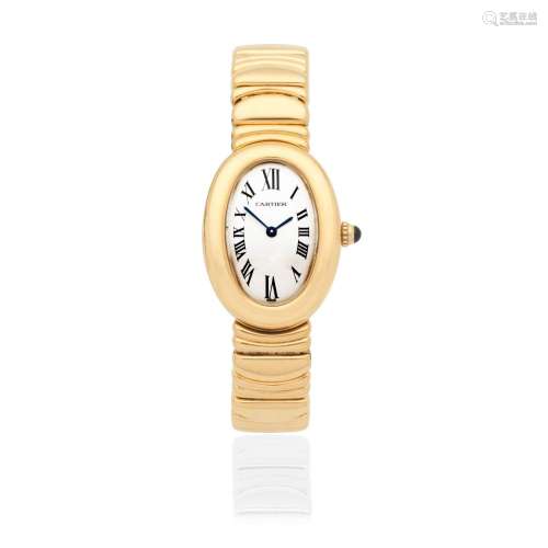 Cartier. A lady's 18K gold quartz bracelet watch  Baignoire,...