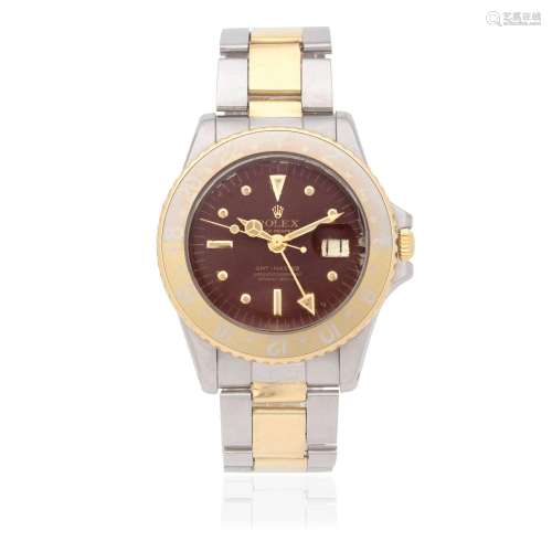 Rolex. A stainless steel and gold automatic calendar bracele...