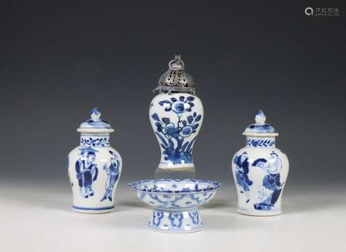 China, three small blue and white jars and covers and a mini...