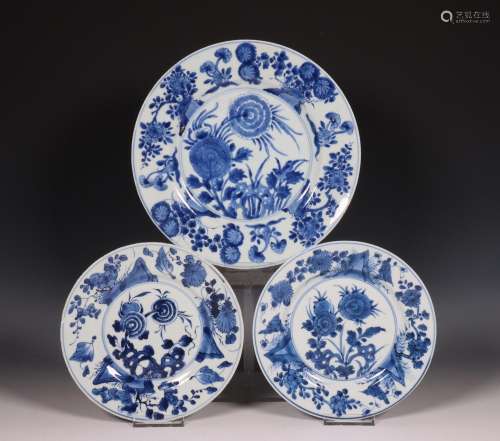 China, three blue and white porcelain aster plates, 18th cen...