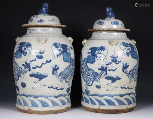 China, pair of blue and white dragon jars and covers, 19th c...