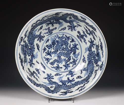 China, large blue and white porcelain dragon bowl, 20th cent...