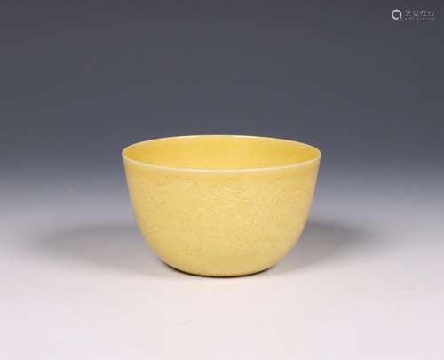 China, yellow-glazed sgraffito porcelain dragon cup, 20th ce...