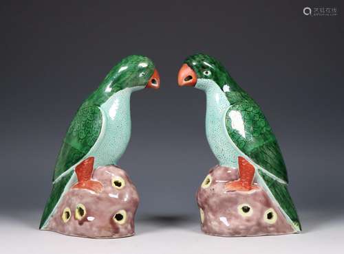 China, pair of green-glazed porcelain models of parrots, mod...