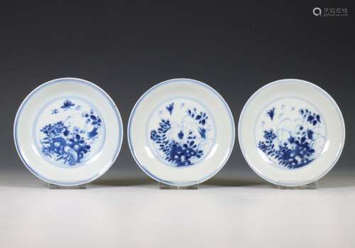 China, set of three blue and white saucers, early 18th centu...