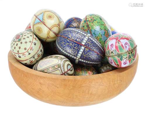 Collection of decorativetin metal egg-shaped boxes, each wit...