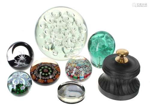 Seven decorative glass paperweights, to include a green Nail...