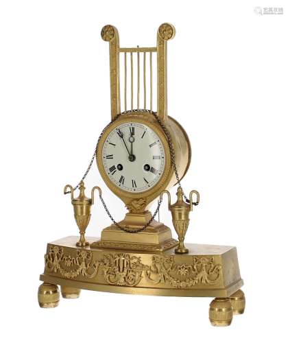French Empire ormolu two train mantel clock with silk suspen...