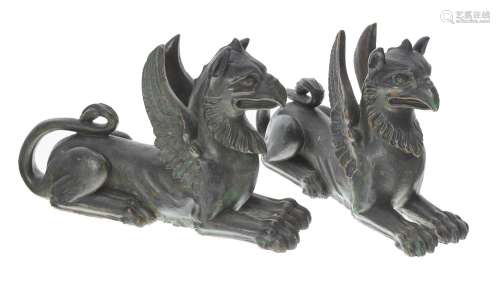 Pair of 19th century wood carvings of griffins,with verdigri...