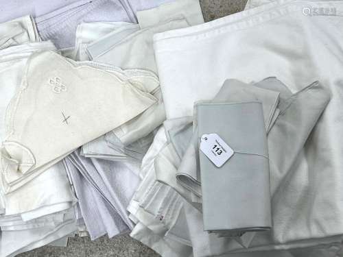 Collection of assorted white cotton table cloths, place mats...