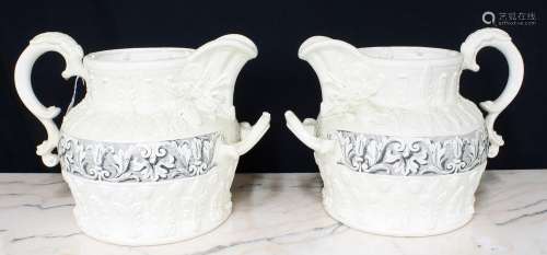 Pair of large antique style relief moulded water jugs, with ...