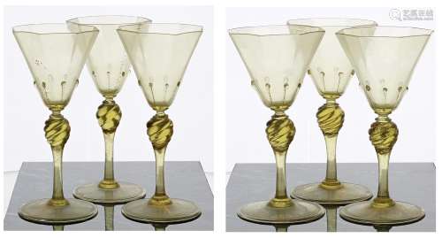 Set of six Venetian amber wine glasses,the octagonal bowls o...