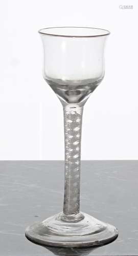 Georgian cordial glass with an opaque-twist stem on a circul...