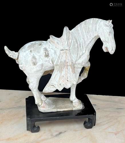 Chinese unglazed pottery horse, Tang dynasty,upon a later st...