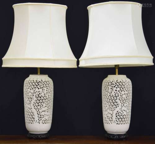 Pair of ornate reticulated porcelain table lamps with shades...