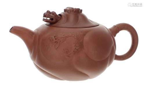 ChineseYixing red ware teapot and cover,with dragon relief d...