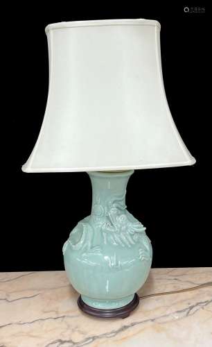 Chinese celadon glaze porcelain table lamp, decorated in rel...
