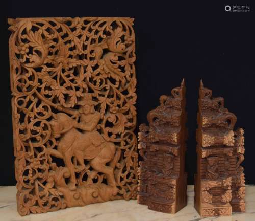 Pair of decorative an intricatelycarved wooden bookends,poss...
