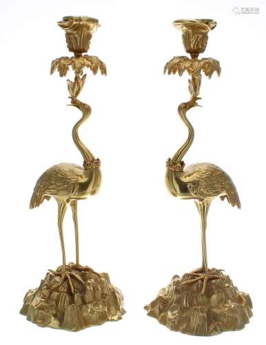 Pair of good quality gilt metal stork figural candlesticks,1...