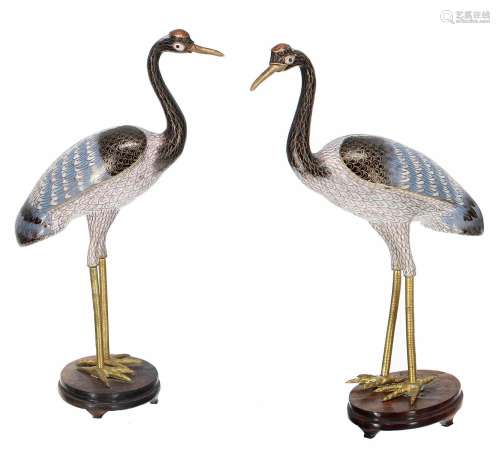 Pair of Japanese cloisonnefigures of storks on stands, 14.5h...