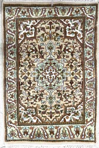 Small Kashmir pattern rug, with a central floral medallion o...