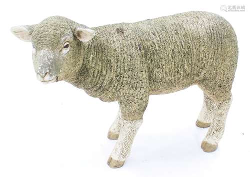 Weathered moulded resin sculpture of a standing lamb, 17 hig...