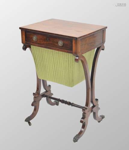 Regency rosewood work table, the rectangular top over a sing...