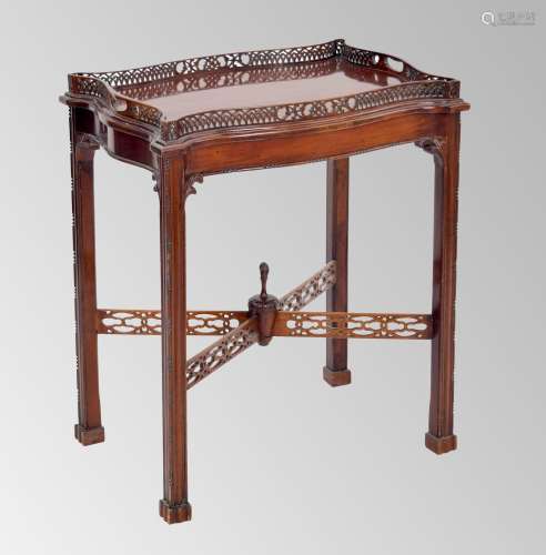 Chippendale style mahogany serpentine tray on stand, the tra...