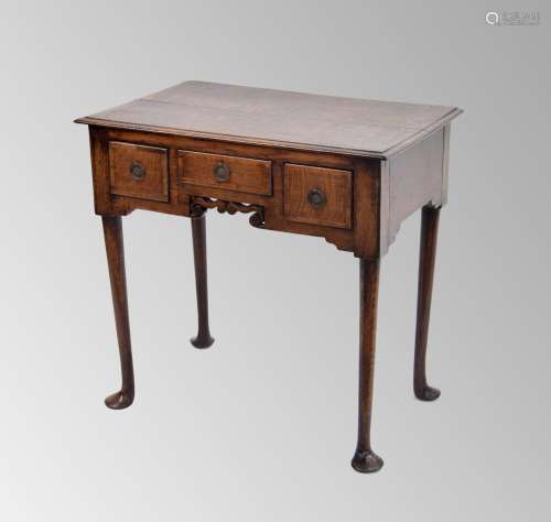 18th century oak lowboy, the rectangular moulded top with th...