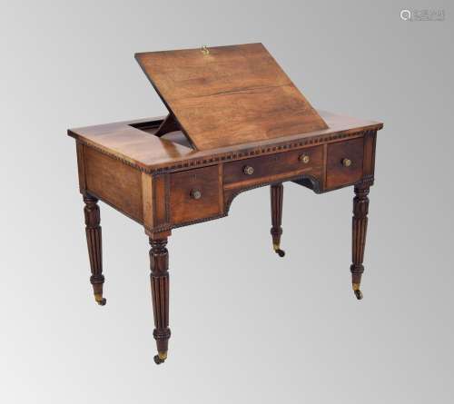 Regency rosewood library table/desk,the top with hinged lift...