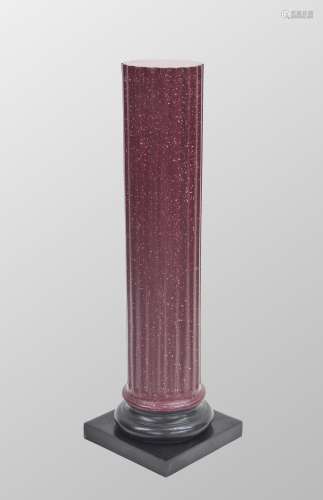 Decorative faux porphery column, the fluted column upon a bl...