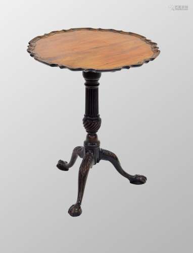 Georgian mahogany tripod table, the pie-crust top above a fl...