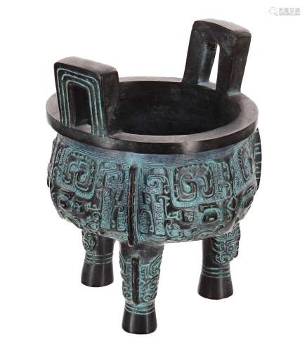 Chinese twin-handled cast bronze tripod censor,with carved a...