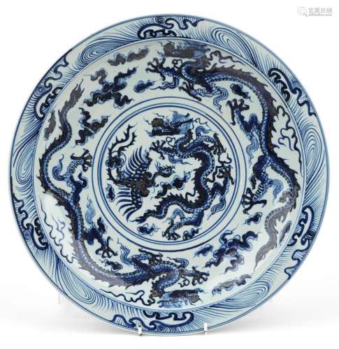 Chinese blue and white porcelain charger hand painted with d...