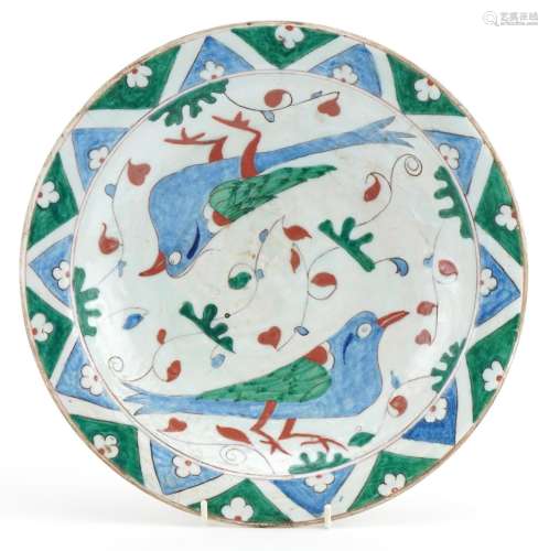 Turkish Iznik pottery plate hand painted with birds and styl...