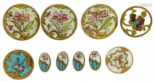 Ten early 20th century brass and enamel buttons comprising n...