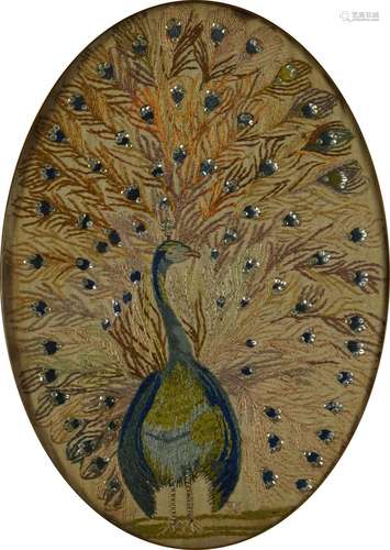 Georgian oval embroidery of a peacock embellished with sequi...