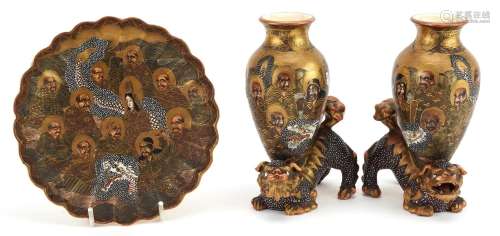Pair of Japanese Satsuma pottery vases surmounted on Foo dog...