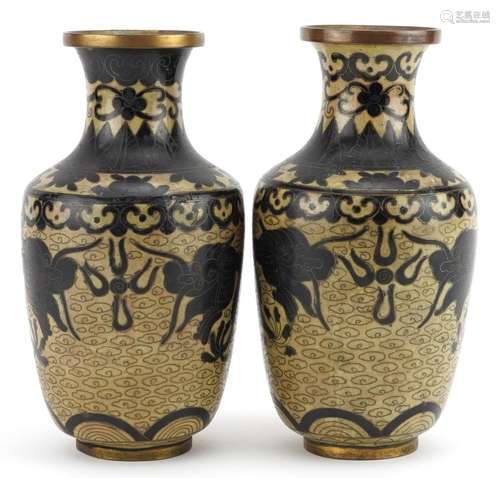 Pair of Chinese cloisonne vases enamelled with dragons chasi...