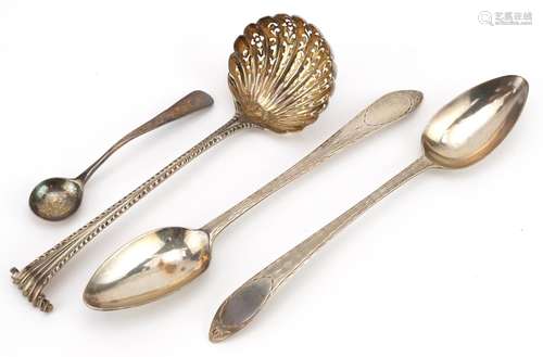 Four Georgian and later silver spoons including a George III...