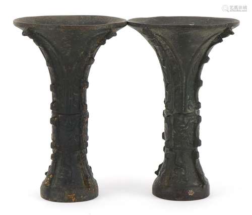 Pair of Chinese patinated bronze Gu archaic style vases, eac...