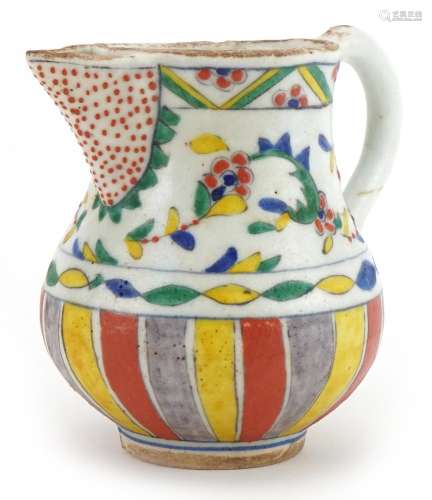 Turkish pottery milk jug hand painted with stylised flowers ...