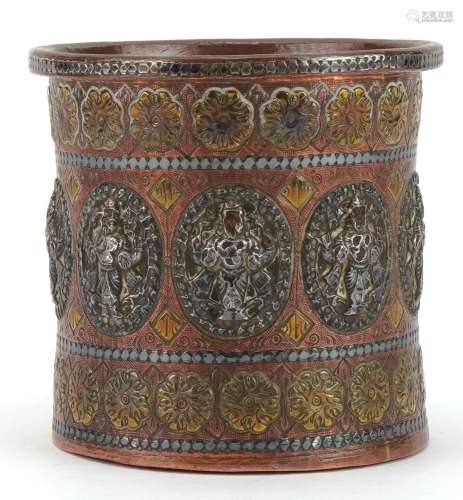 Indian copper vase with applied silver deities and brass flo...