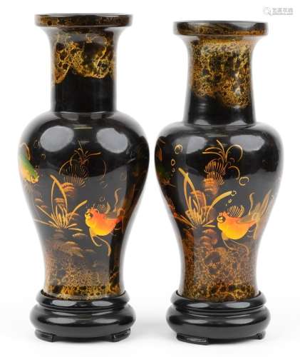 Pair of Chinese black lacquered yen yen vases gilded with fi...