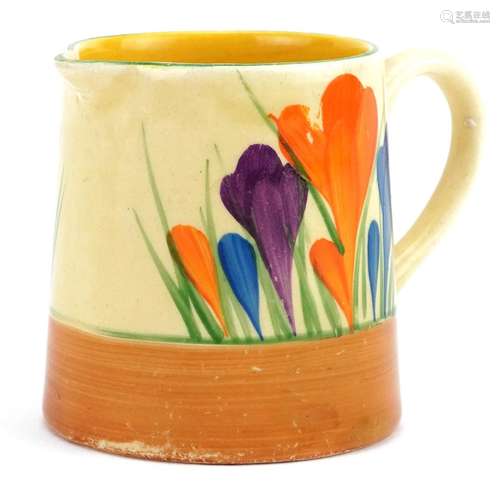 Clarice Cliff, Art Deco Bizarre milk jug hand painted in the...