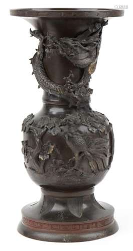 Large Japanese patinated bronze vase decorated in relief wit...